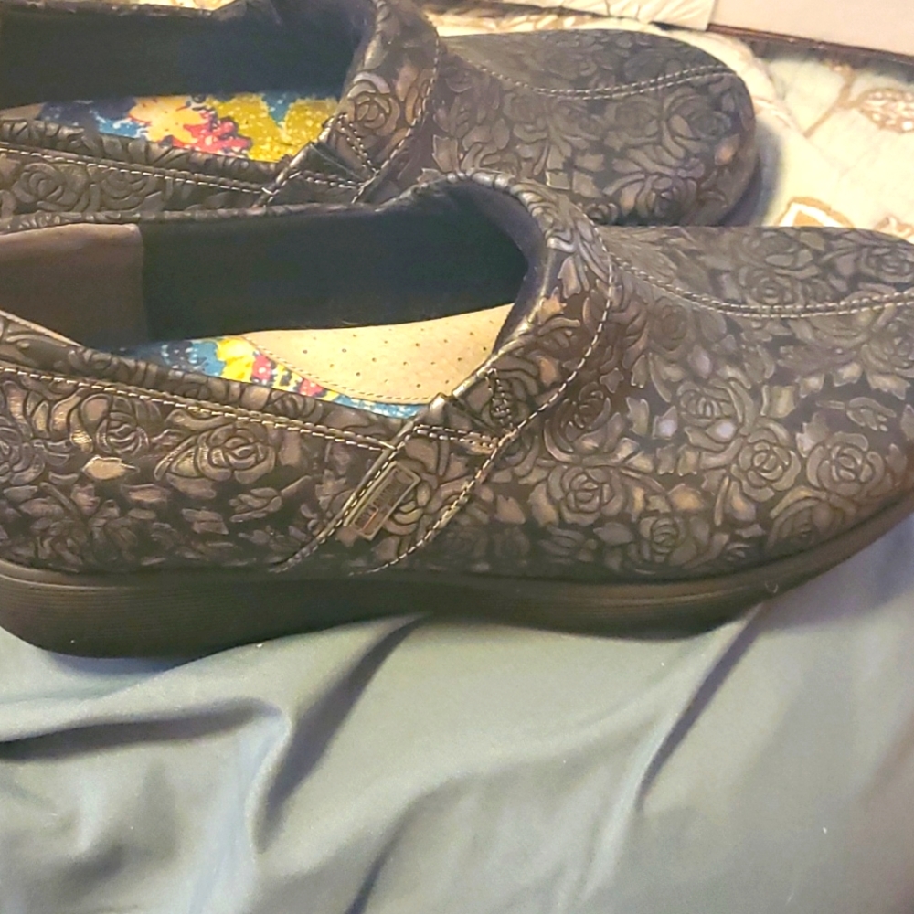 Grey's Anatomy clogs, black with silver roses.  Size 9.5